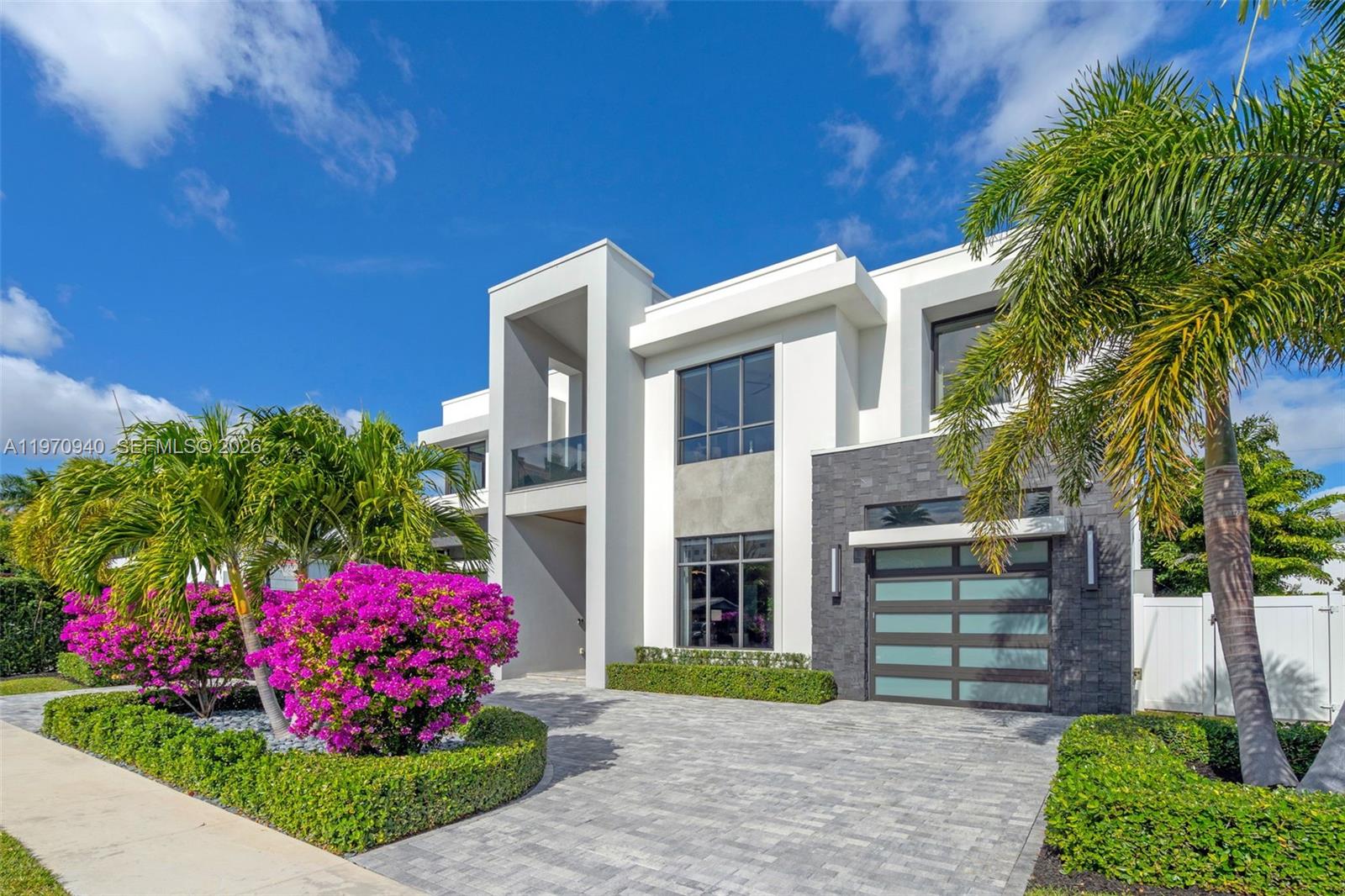 225 Northeast 3rd Street Boca Raton, FL 33432 - Photo 1 of 36 a view of a house with a backyard and garden