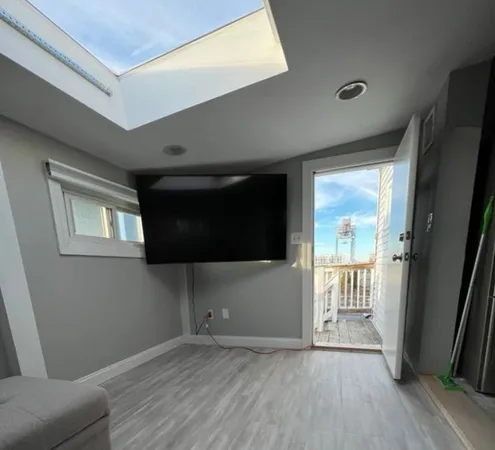 a view of livingroom with furniture and wooden floor