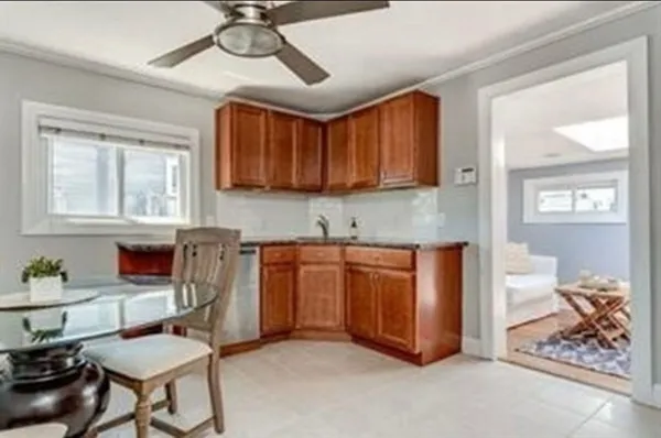 a kitchen with stainless steel appliances granite countertop a stove and a sink