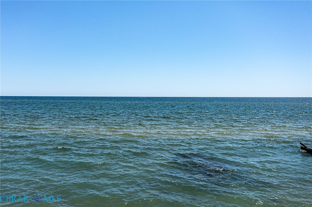 13 Leming Avenue Reedville, VA 22539 - Photo 48 of 50 Expansive water with clear blue skies above