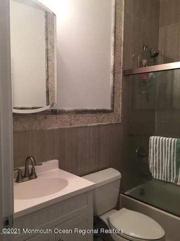 a bedroom with a bed and a table