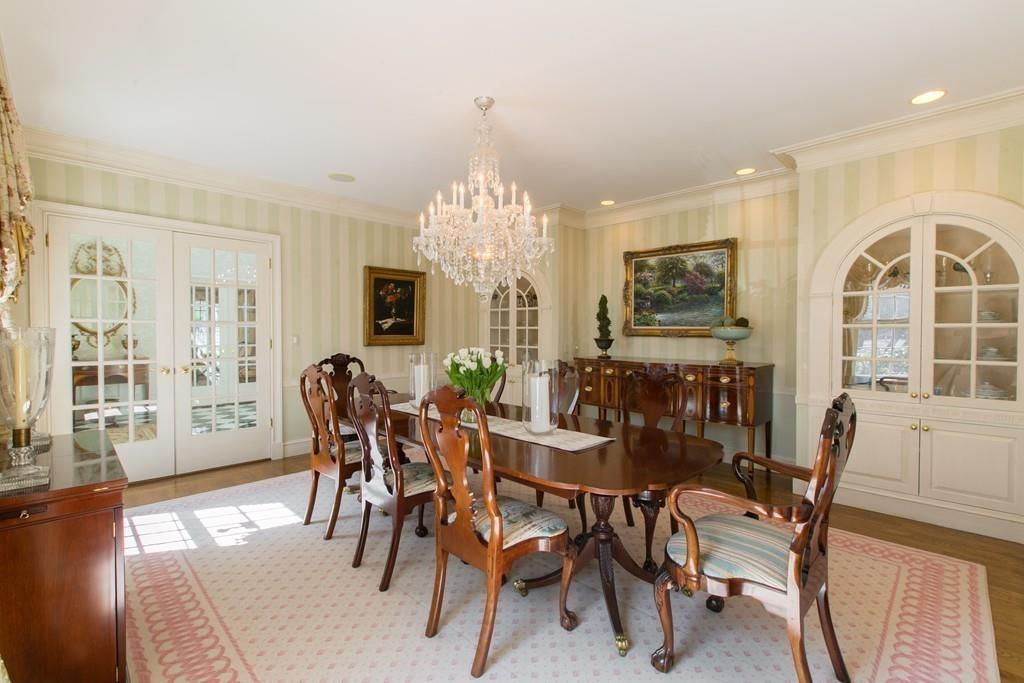 4 Garland Road Lincoln, MA 01773 - Photo 12 of 31 a view of a dining room with furniture window and wooden floor