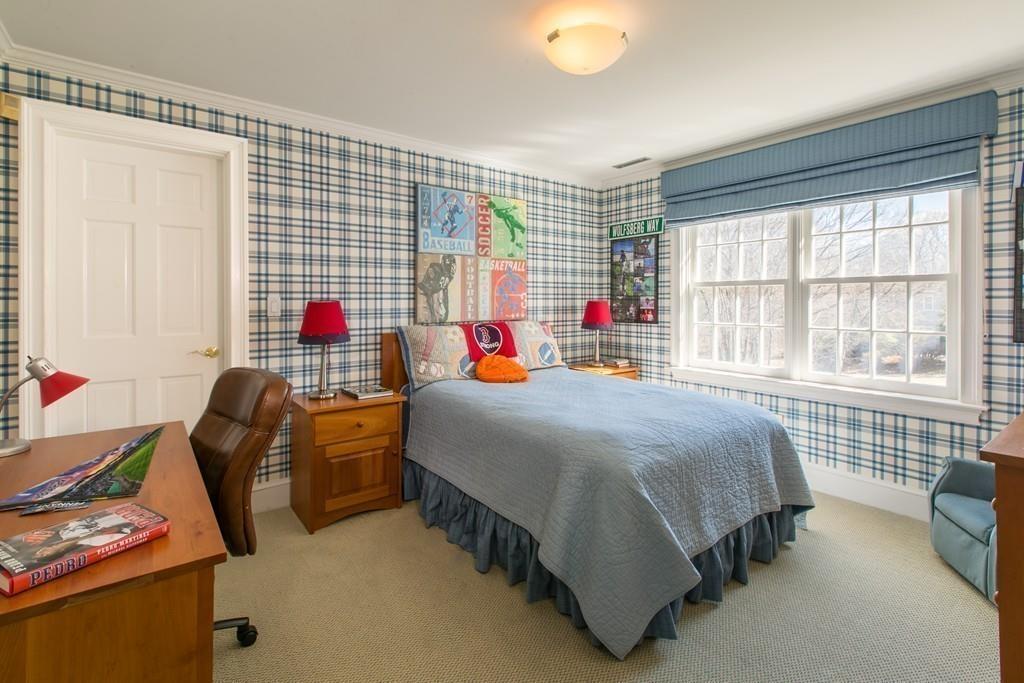 4 Garland Road Lincoln, MA 01773 - Photo 17 of 31 a bedroom with bed and windows