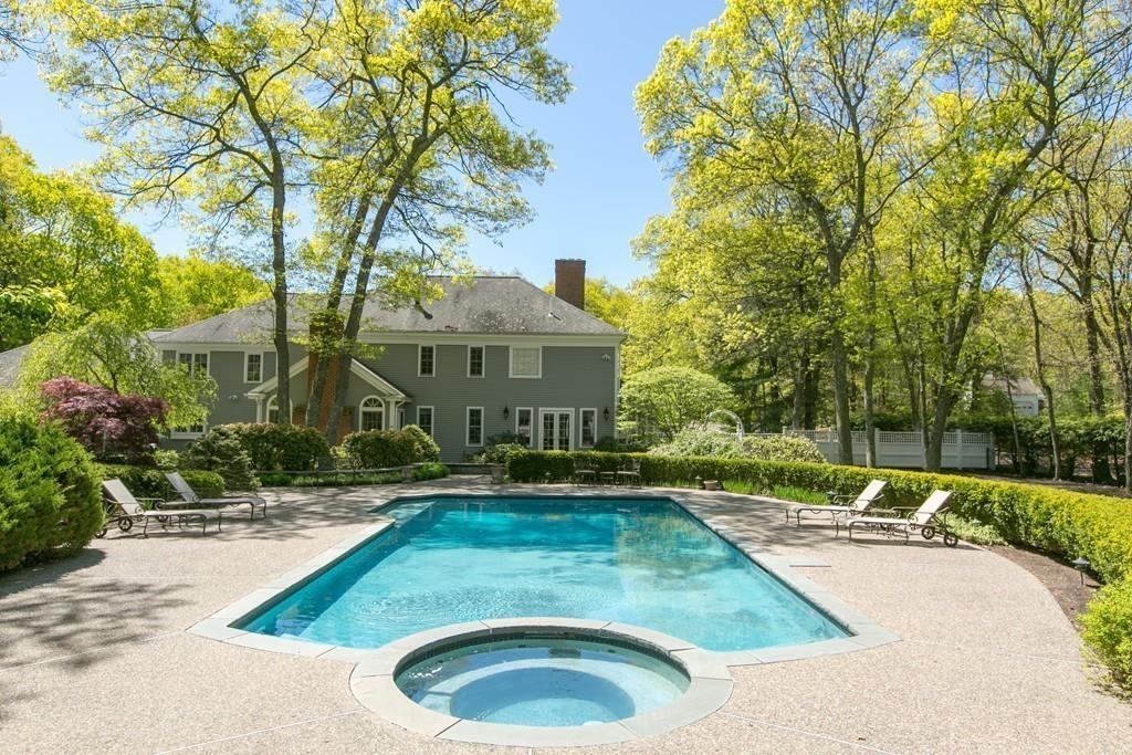 4 Garland Road Lincoln, MA 01773 - Photo 24 of 31 front view of a house with a yard
