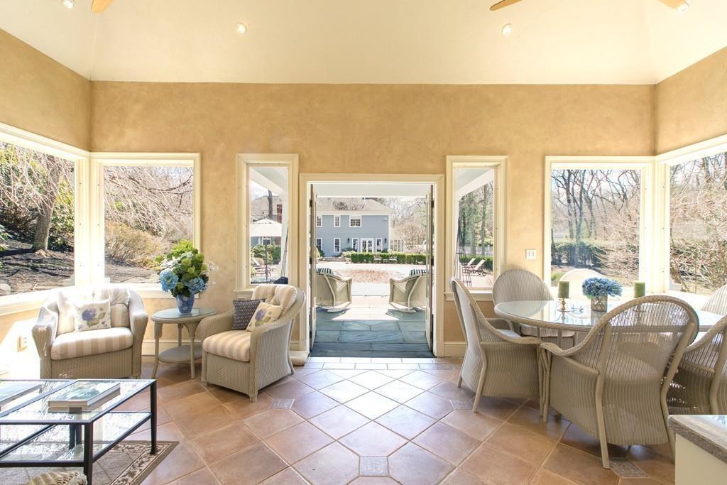 4 Garland Road Lincoln, MA 01773 - Photo 28 of 31 a living room with furniture and a large window