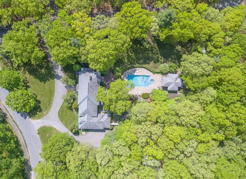 4 Garland Road Lincoln, MA 01773 - Photo 31 of 31 an aerial view of a house with a yard and large trees