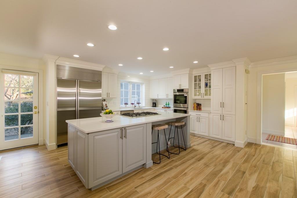 4 Garland Road Lincoln, MA 01773 - Photo 4 of 31 a kitchen with a sink and wooden floor