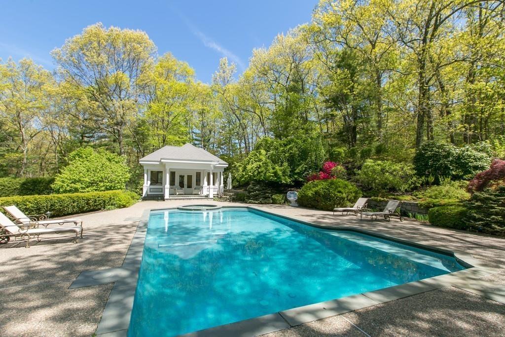 4 Garland Road Lincoln, MA 01773 - Photo 8 of 31 a view of a house with a yard and sitting area