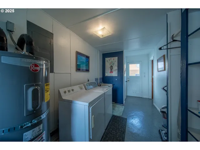 a bathroom with a sink vanity and mirror