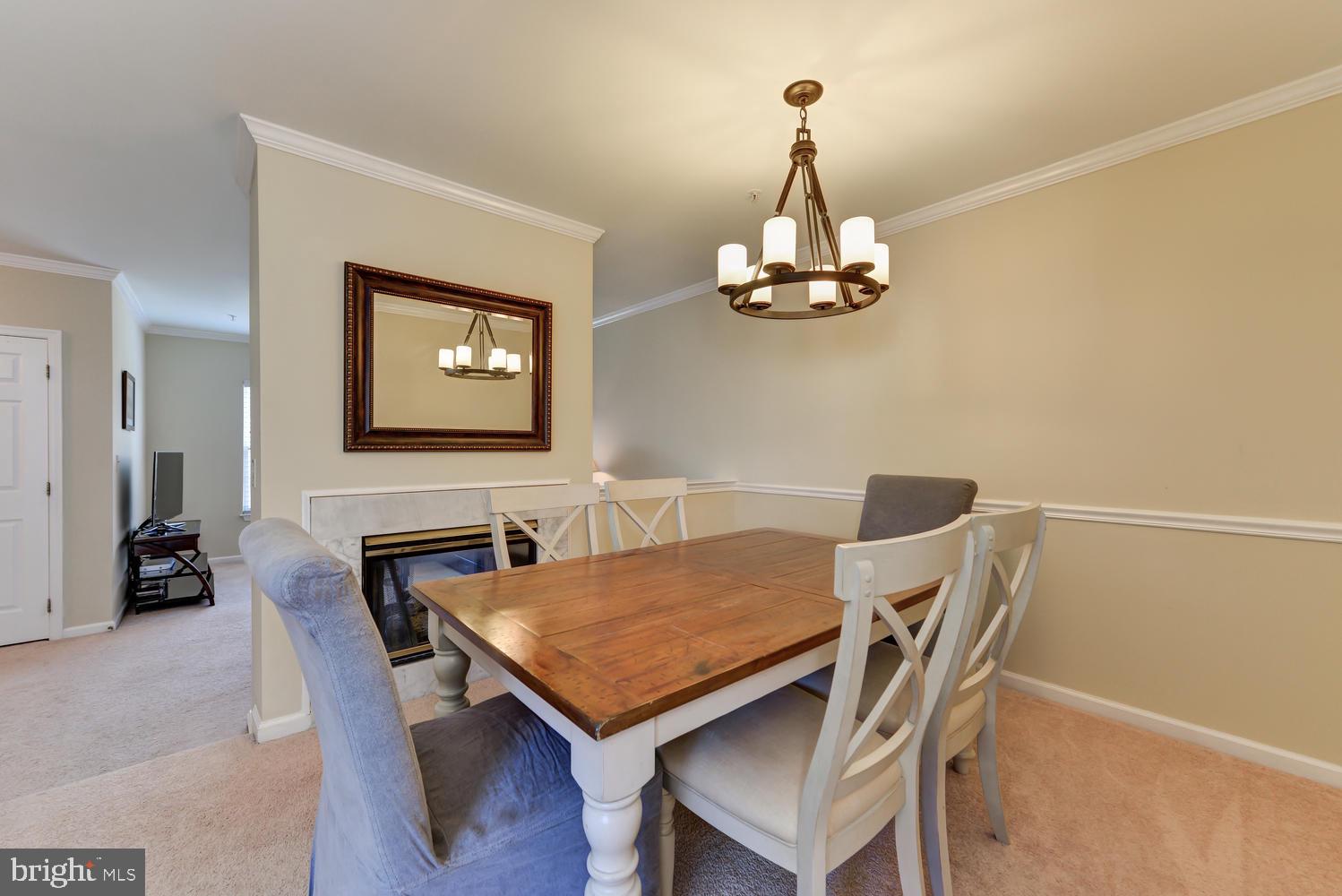 1812 Locust Grove Road Silver Spring, MD 20910 - Photo 14 of 40 Dining Room w/ Dual Sided Fireplace