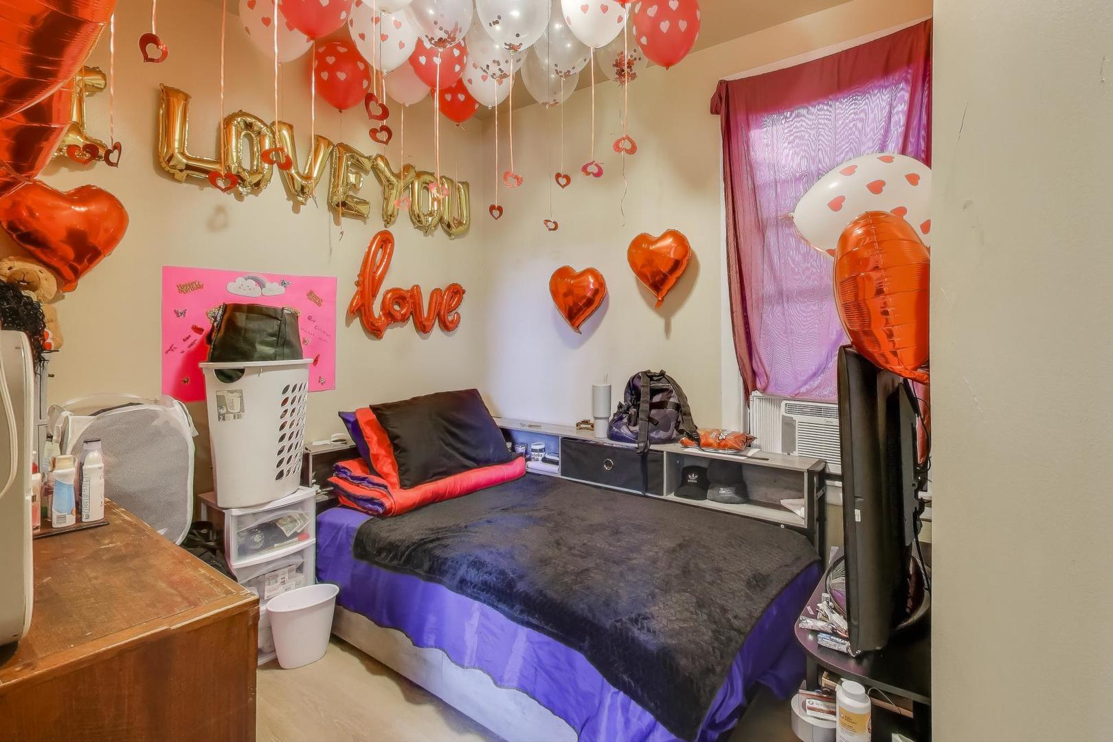 4322 North Monticello Avenue Chicago, IL 60618 - Photo 16 of 37 a bed room with a bed and a desk