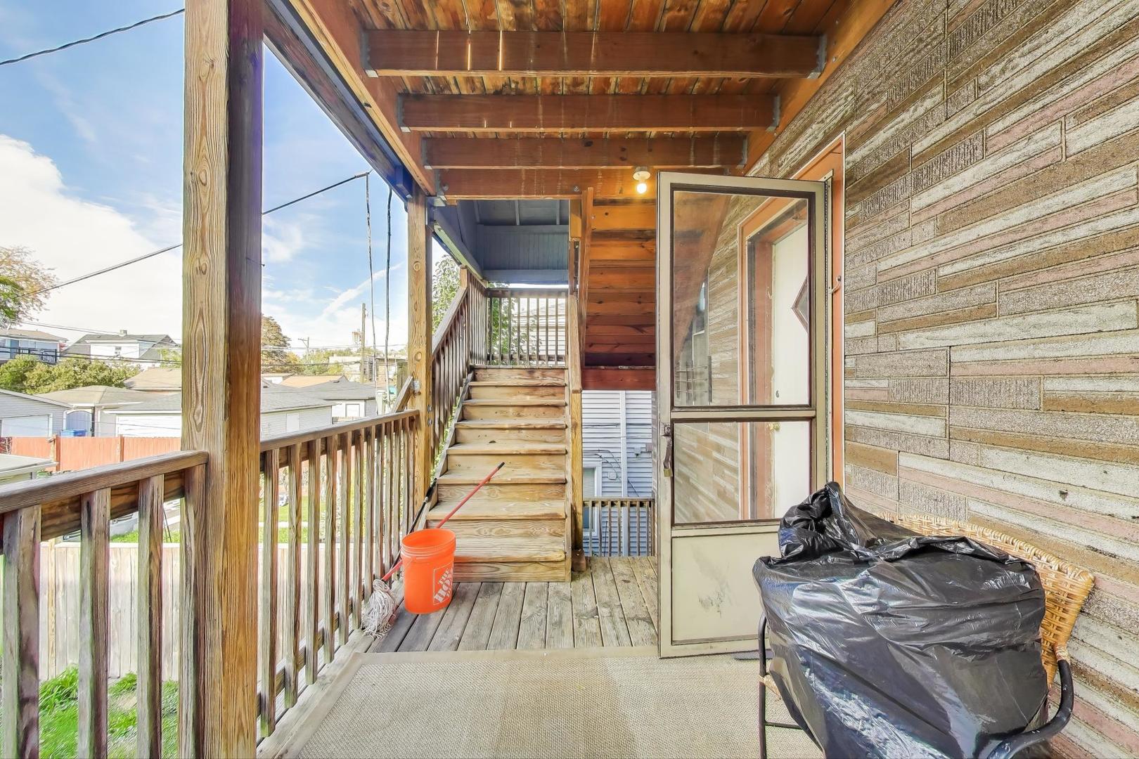 4322 North Monticello Avenue Chicago, IL 60618 - Photo 20 of 37 a view of balcony and wooden floor