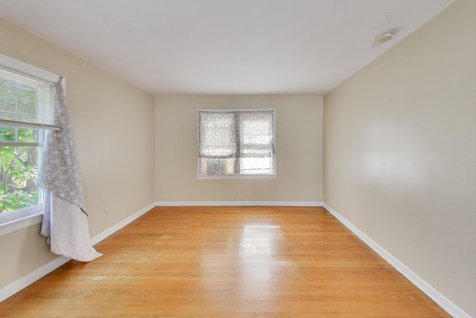 4322 North Monticello Avenue Chicago, IL 60618 - Photo 21 of 37 a view of an empty room with a window