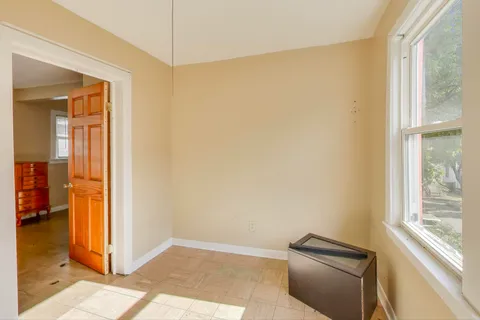 a view of livingroom with workspace
