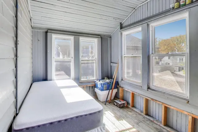 a room with furniture and a window