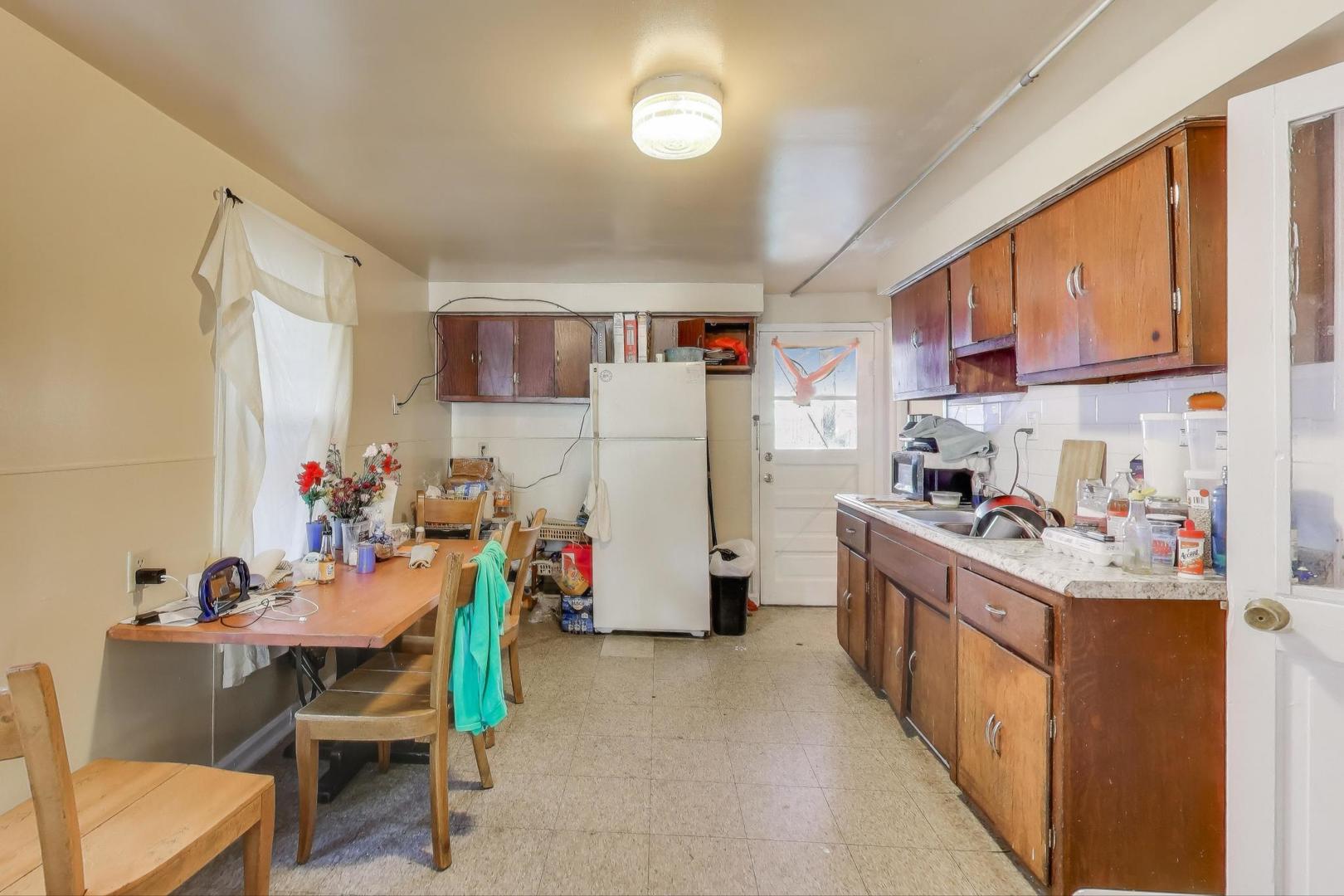 4322 North Monticello Avenue Chicago, IL 60618 - Photo 5 of 37 a room with storage and utility