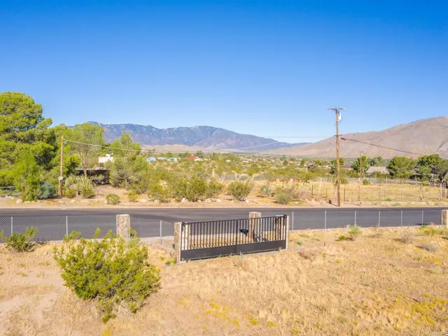 a view of a balcony with an ocean