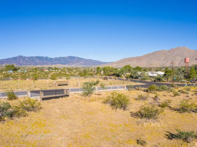 a view of an ocean with a mountain