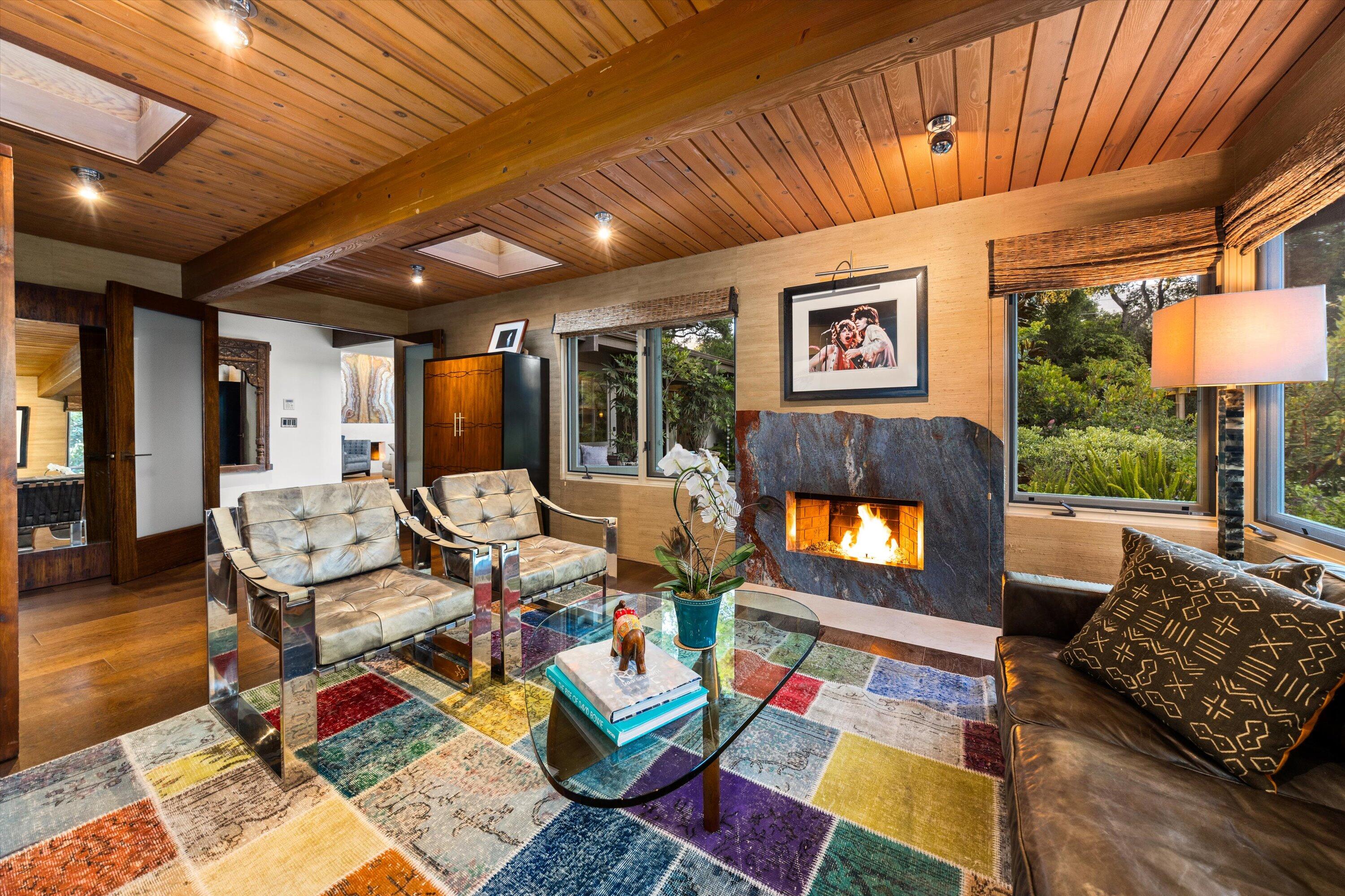 655 Oak Springs Lane Santa Barbara, CA 93108 - Photo 17 of 39 a living room with lots of furniture and a rug