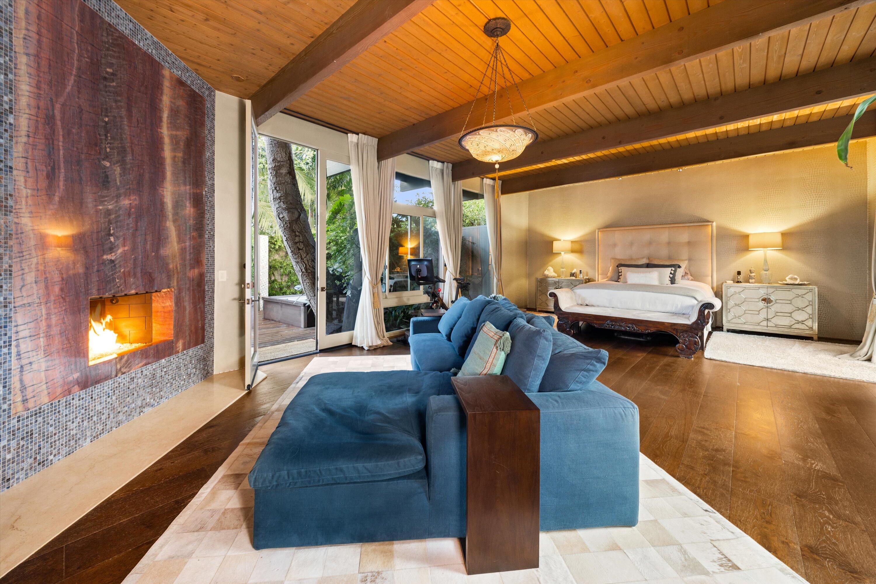 655 Oak Springs Lane Santa Barbara, CA 93108 - Photo 18 of 39 a living room with furniture and a flat screen tv