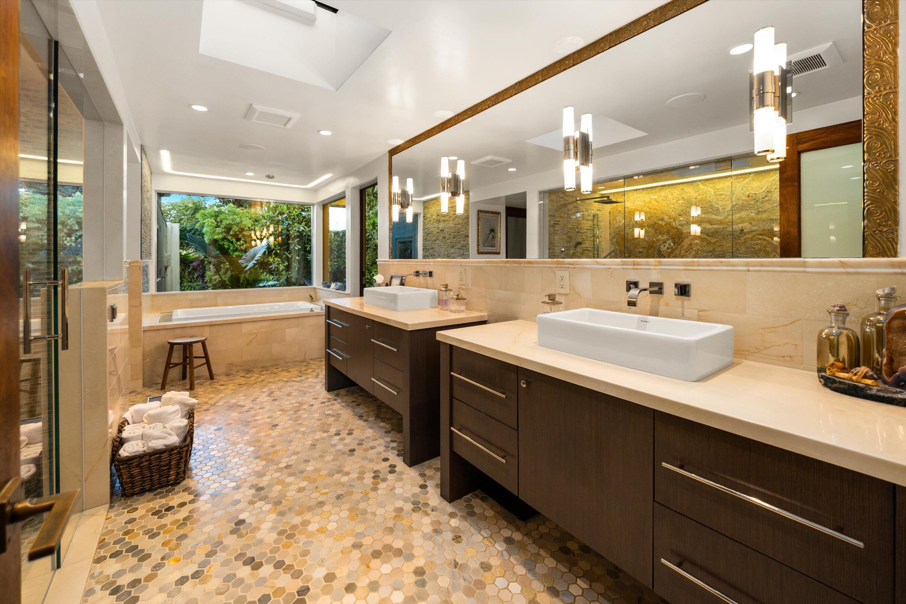 655 Oak Springs Lane Santa Barbara, CA 93108 - Photo 20 of 39 a bathroom with a sink double vanity and a shower