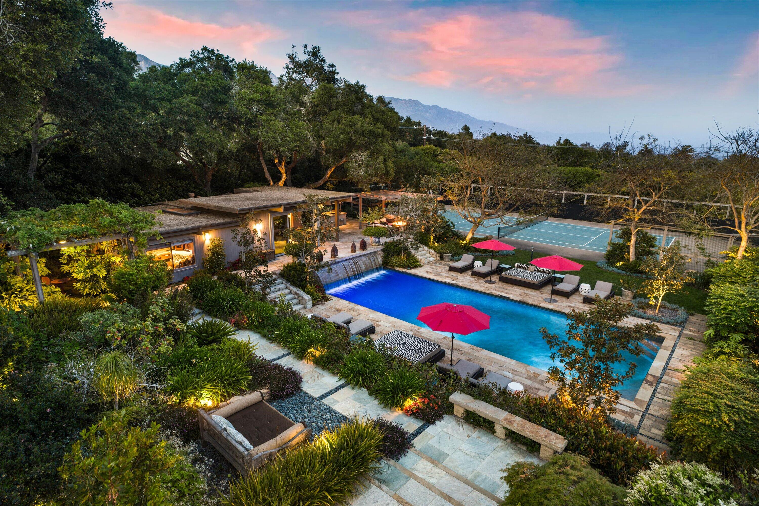 655 Oak Springs Lane Santa Barbara, CA 93108 - Photo 2 of 39 an aerial view of residential houses with outdoor space and swimming pool
