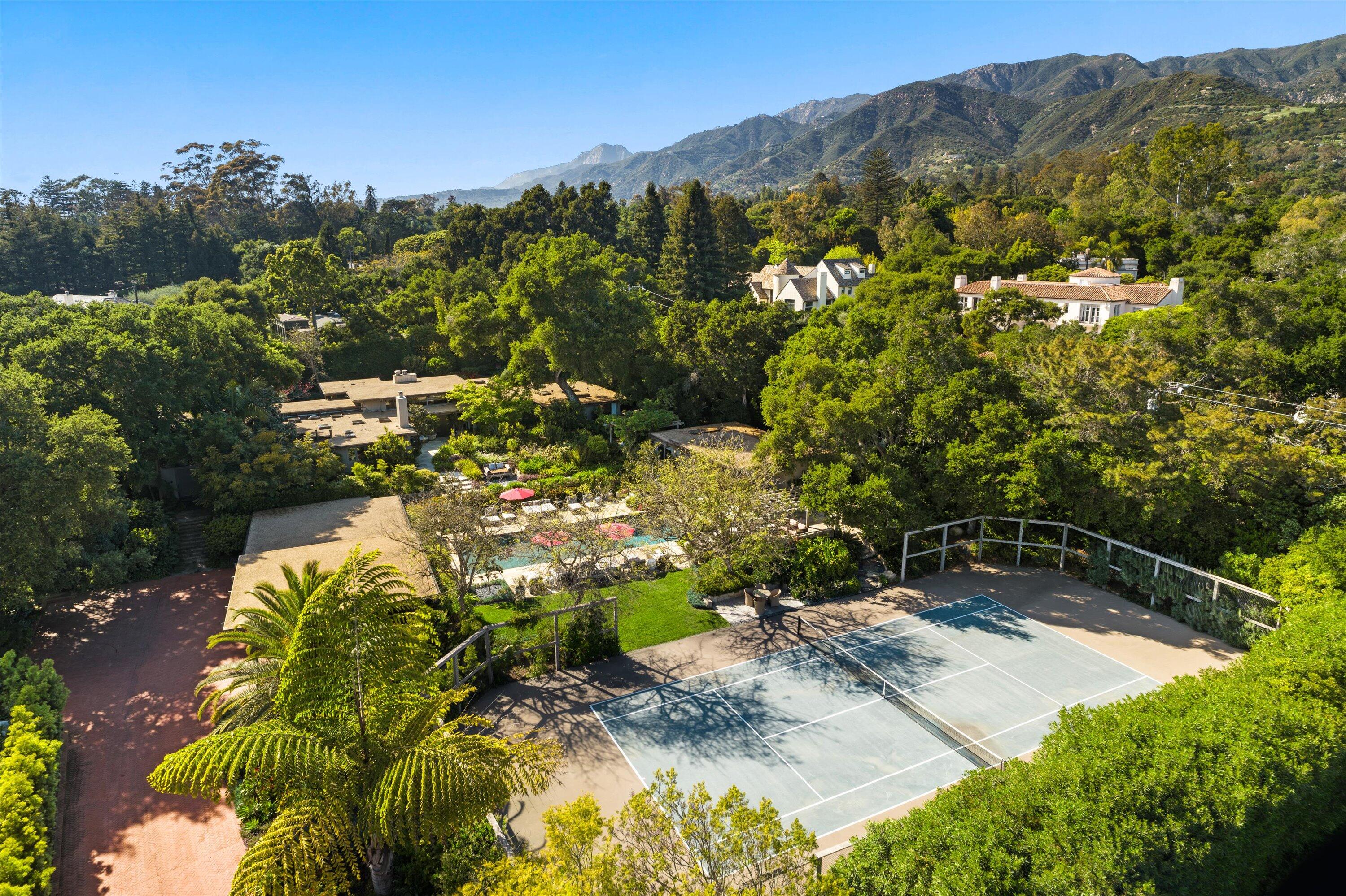 655 Oak Springs Lane Santa Barbara, CA 93108 - Photo 3 of 39 a view of a tree with a yard