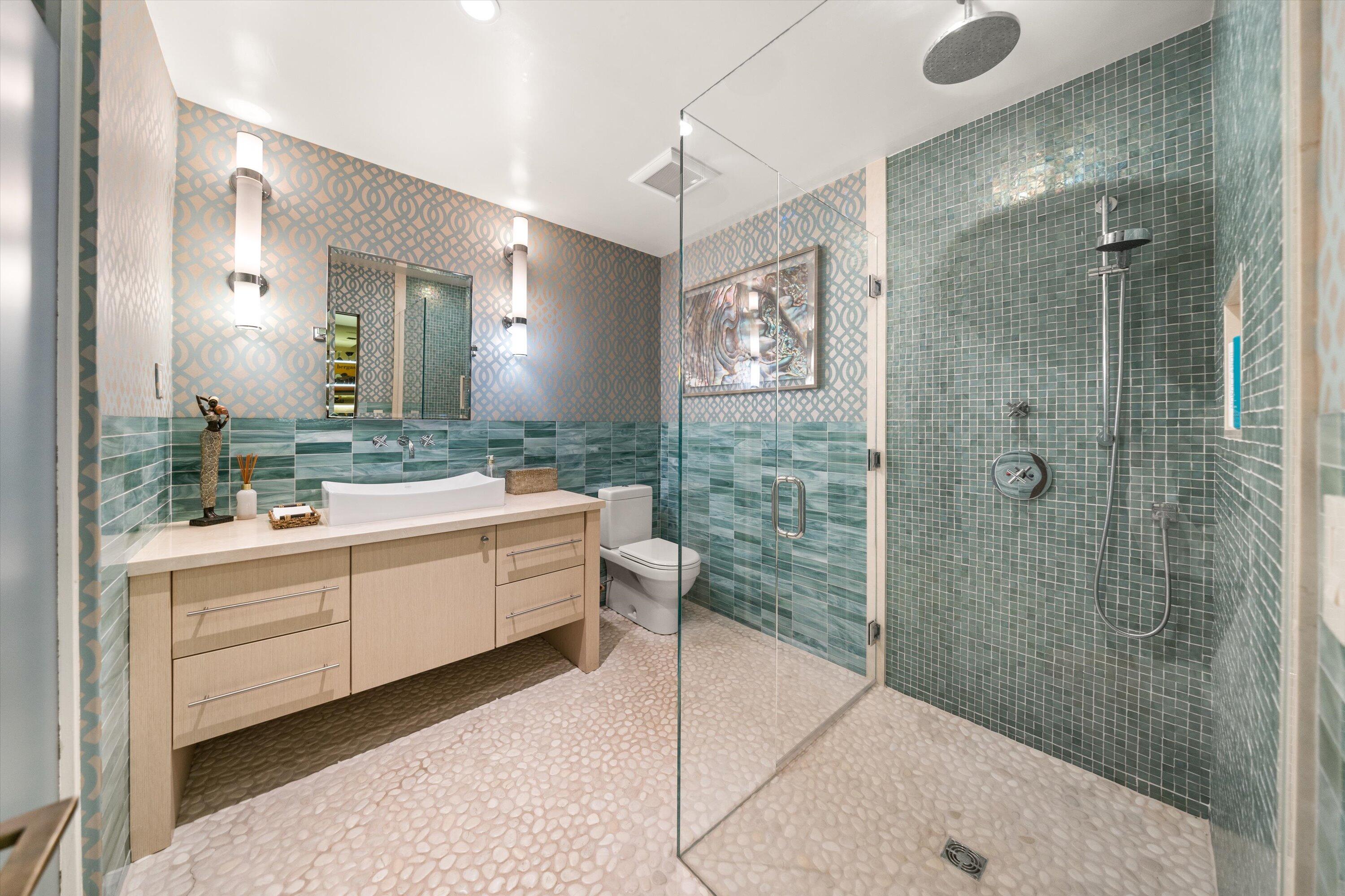 655 Oak Springs Lane Santa Barbara, CA 93108 - Photo 35 of 39 a bathroom with a double vanity sink mirror and shower
