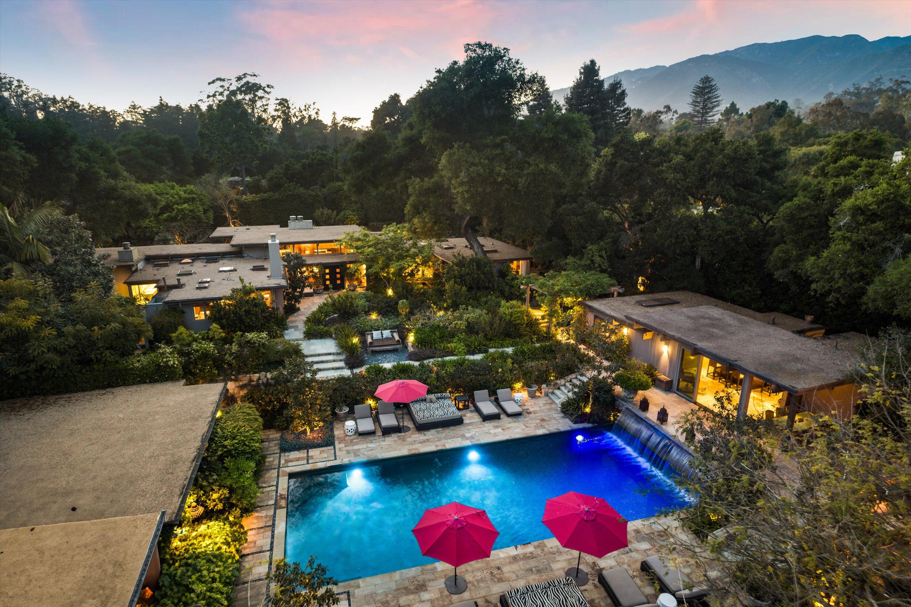 655 Oak Springs Lane Santa Barbara, CA 93108 - Photo 37 of 39 a view of swimming pool with a table and chairs