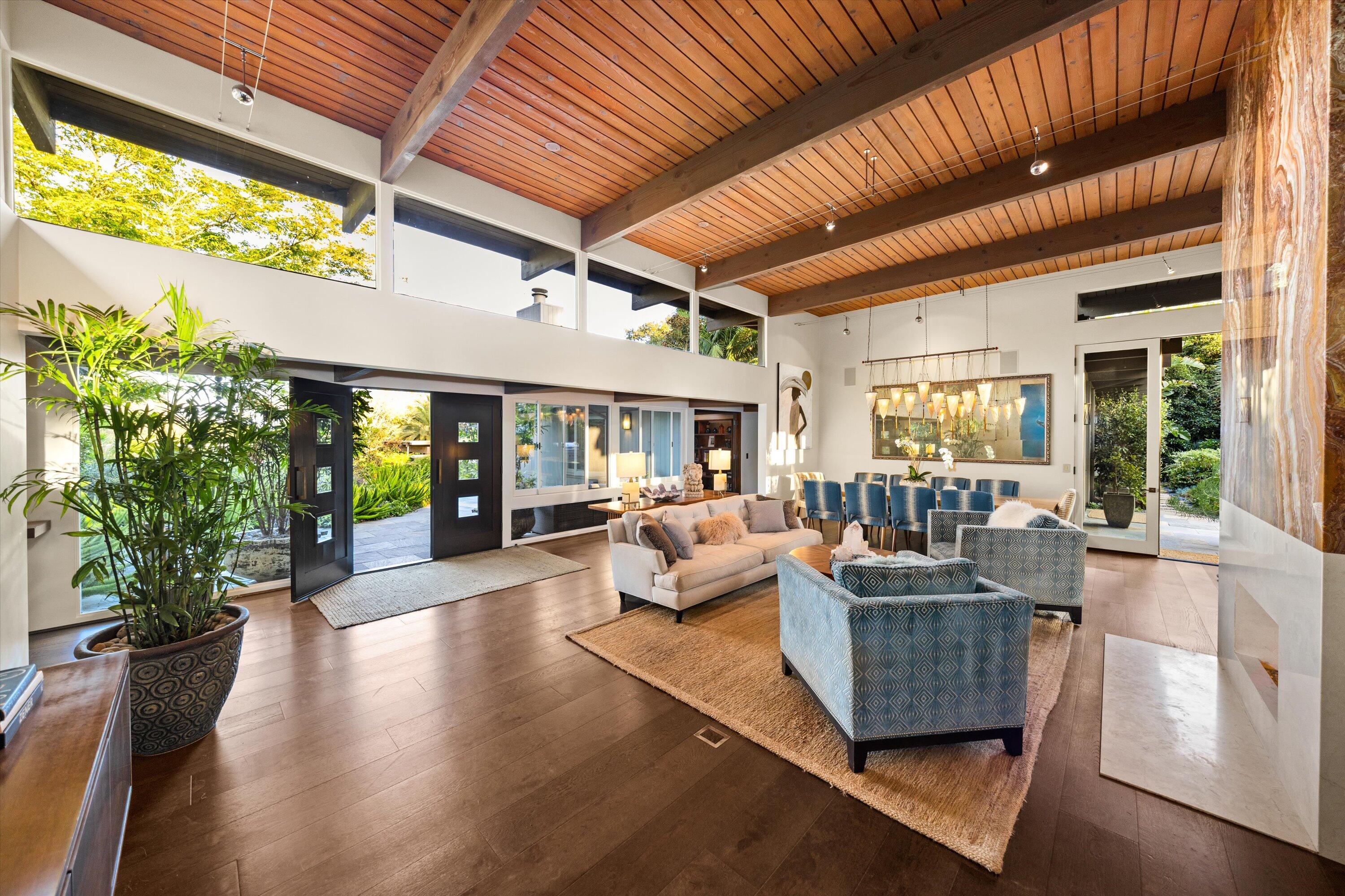 655 Oak Springs Lane Santa Barbara, CA 93108 - Photo 6 of 39 a living room with patio furniture and a potted plant