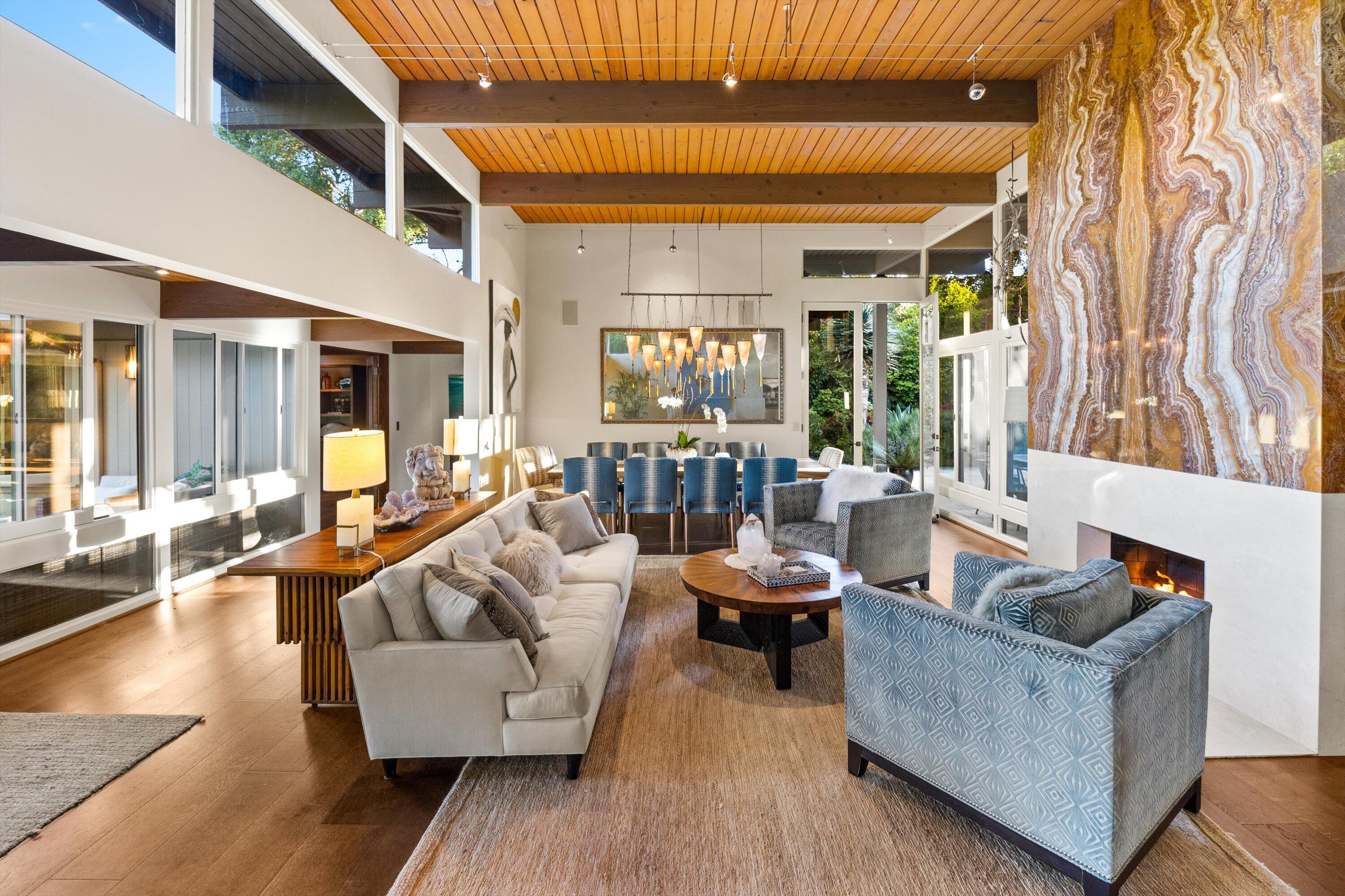 655 Oak Springs Lane Santa Barbara, CA 93108 - Photo 7 of 39 a living room with furniture and a large window