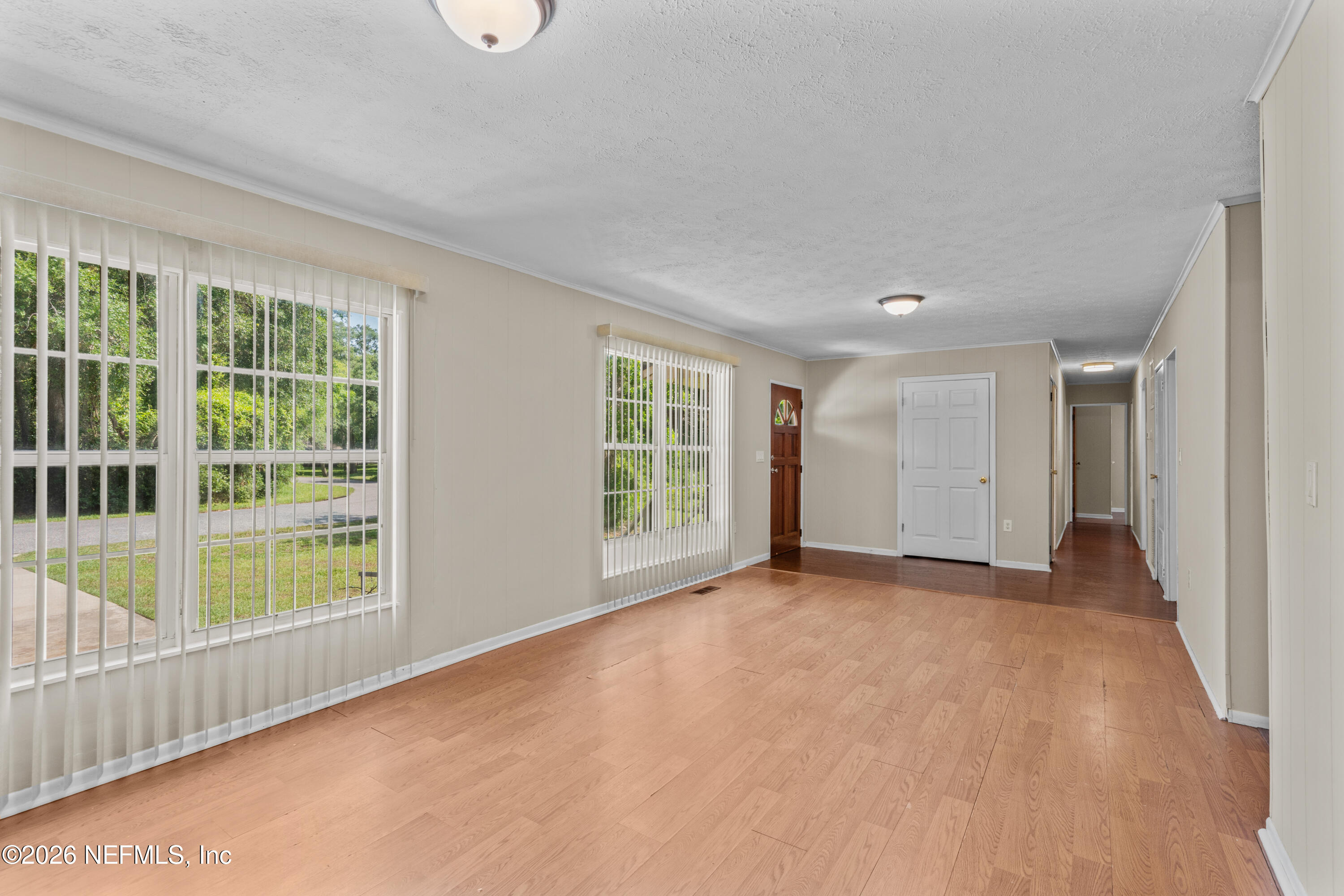 253 Cowry Road St. Augustine, FL 32086 - Photo 6 of 27 a view of an empty room with a window