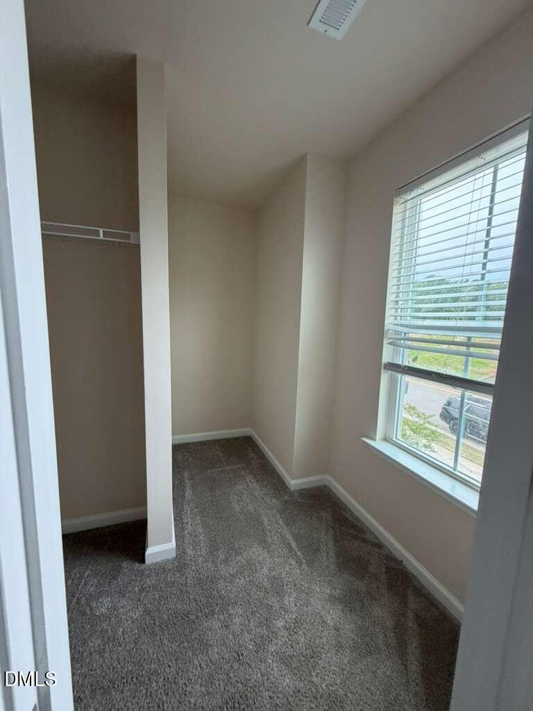 336 Abbots Ml Drive Raleigh, NC 27603 - Photo 24 of 25 an empty room with windows