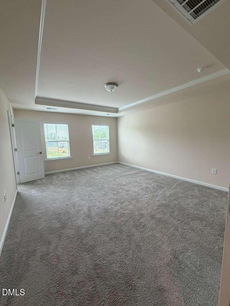 336 Abbots Ml Drive Raleigh, NC 27603 - Photo 8 of 25 a view of an empty room with a window