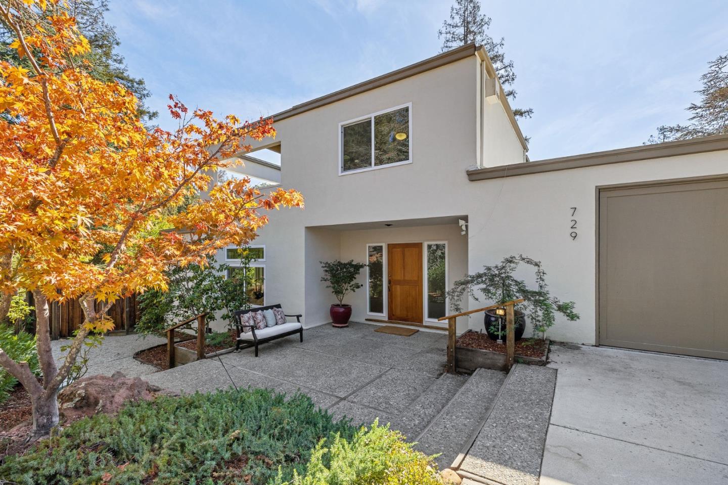 729 Tolman Drive Stanford, CA 94305 - Photo 1 of 48 a view of a patio with table and chairs and potted plants