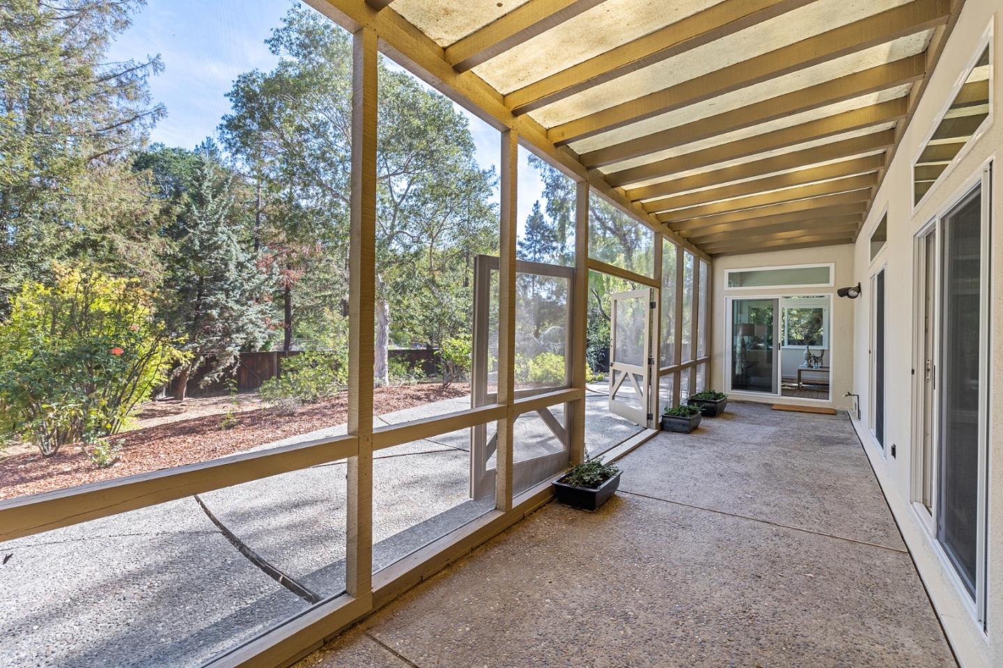 729 Tolman Drive Stanford, CA 94305 - Photo 18 of 48 a view of a room with window and wooden floor