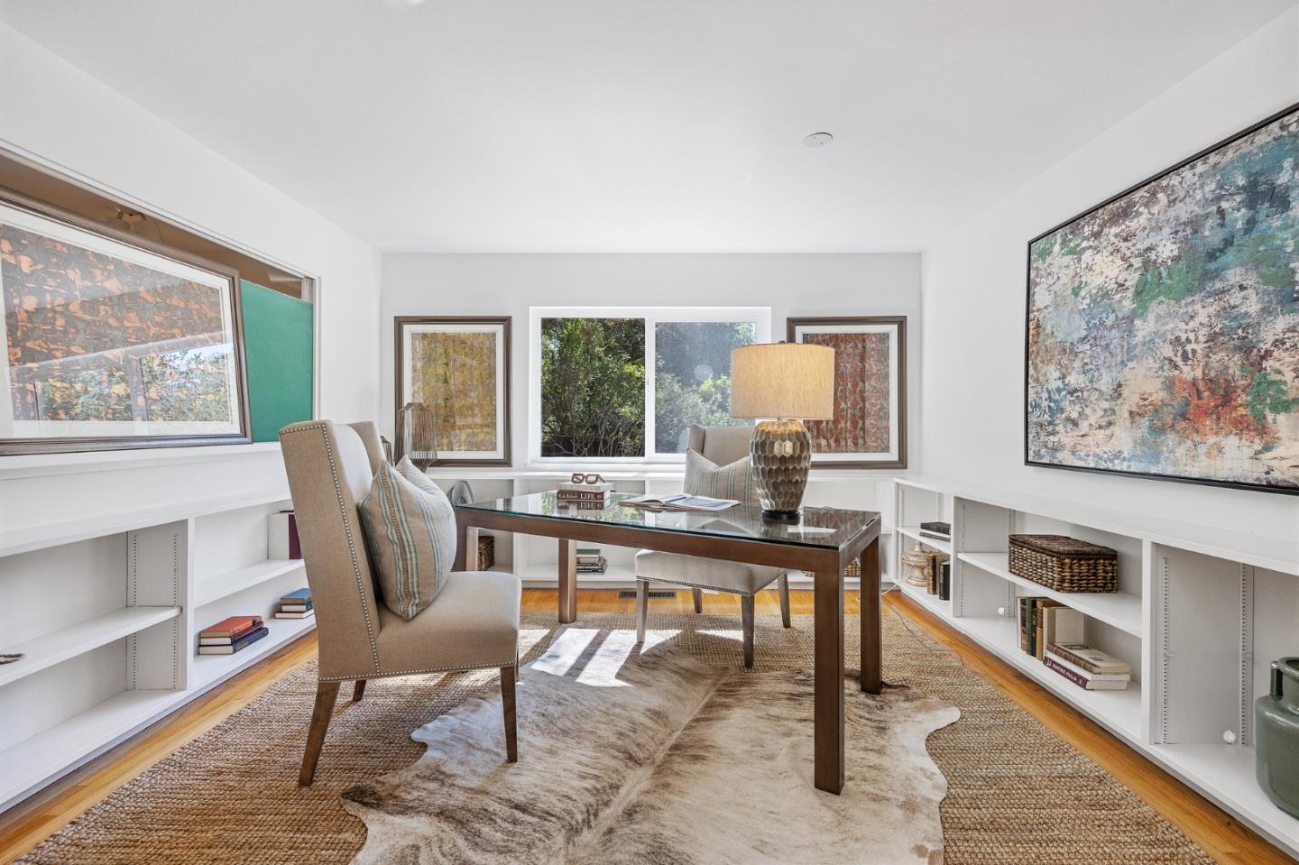 729 Tolman Drive Stanford, CA 94305 - Photo 19 of 48 a view of a workspace with furniture and a potted plant