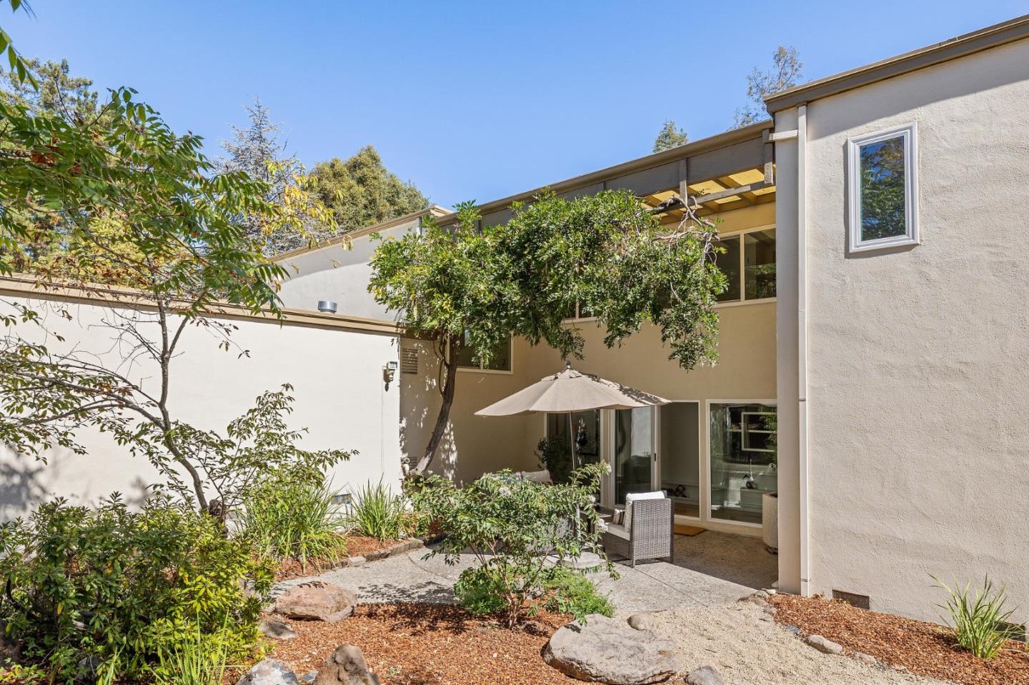729 Tolman Drive Stanford, CA 94305 - Photo 23 of 48 a front view of a house with garden