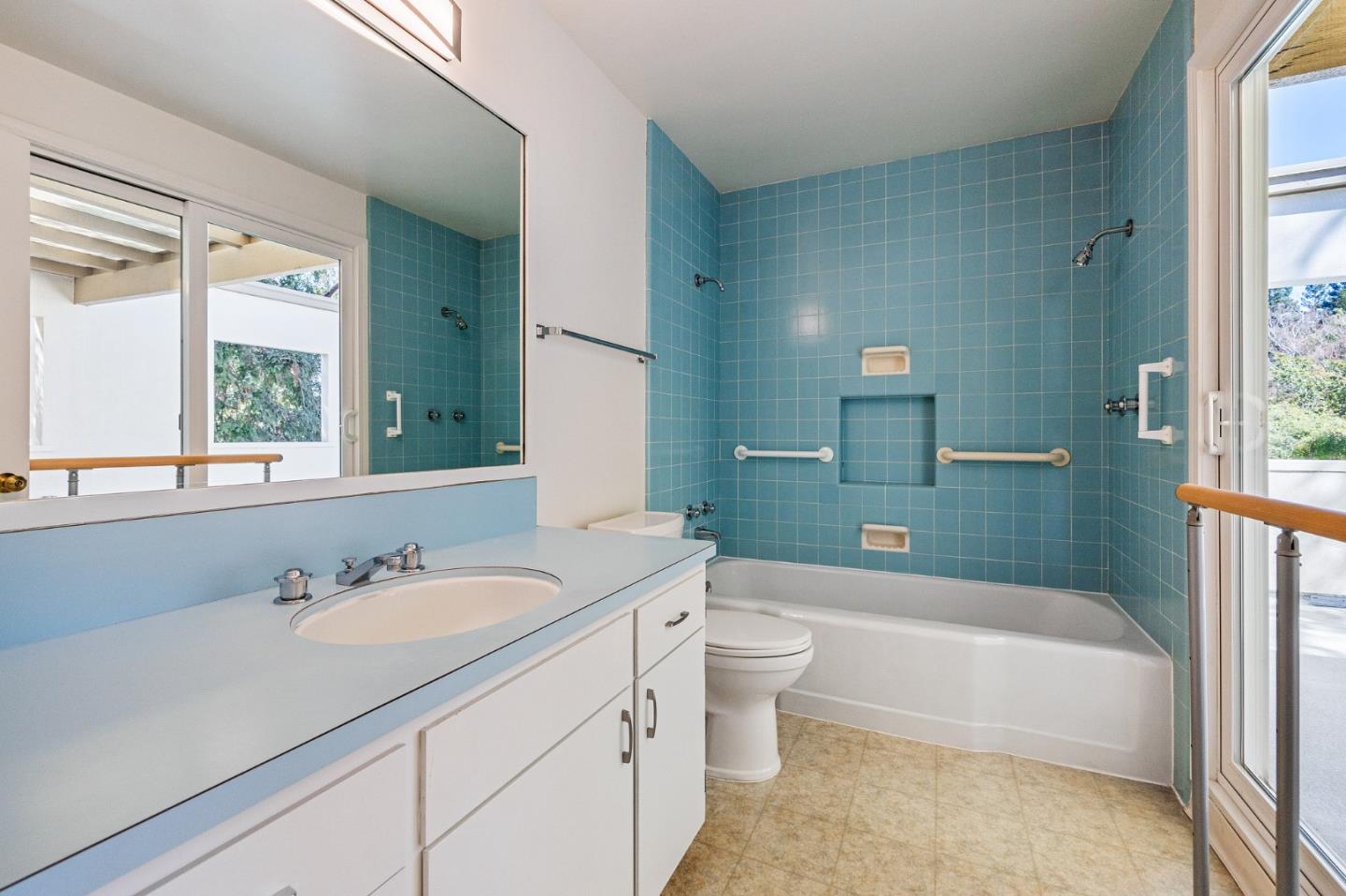 729 Tolman Drive Stanford, CA 94305 - Photo 28 of 48 a bathroom with a granite countertop sink a toilet and bathtub