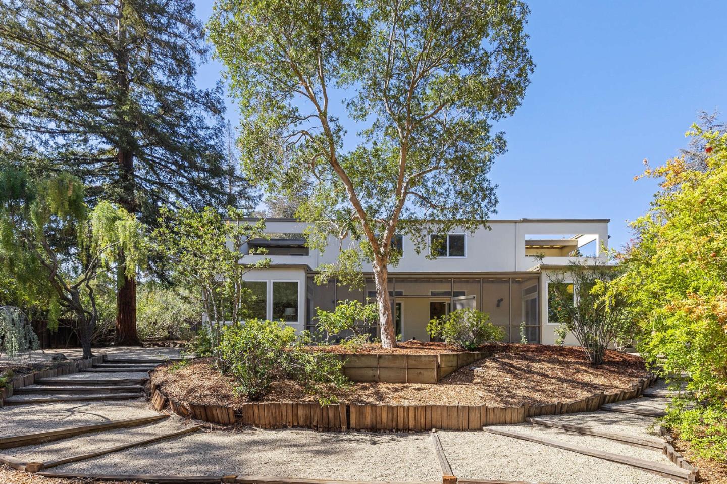 729 Tolman Drive Stanford, CA 94305 - Photo 39 of 48 front view of a house with a tree