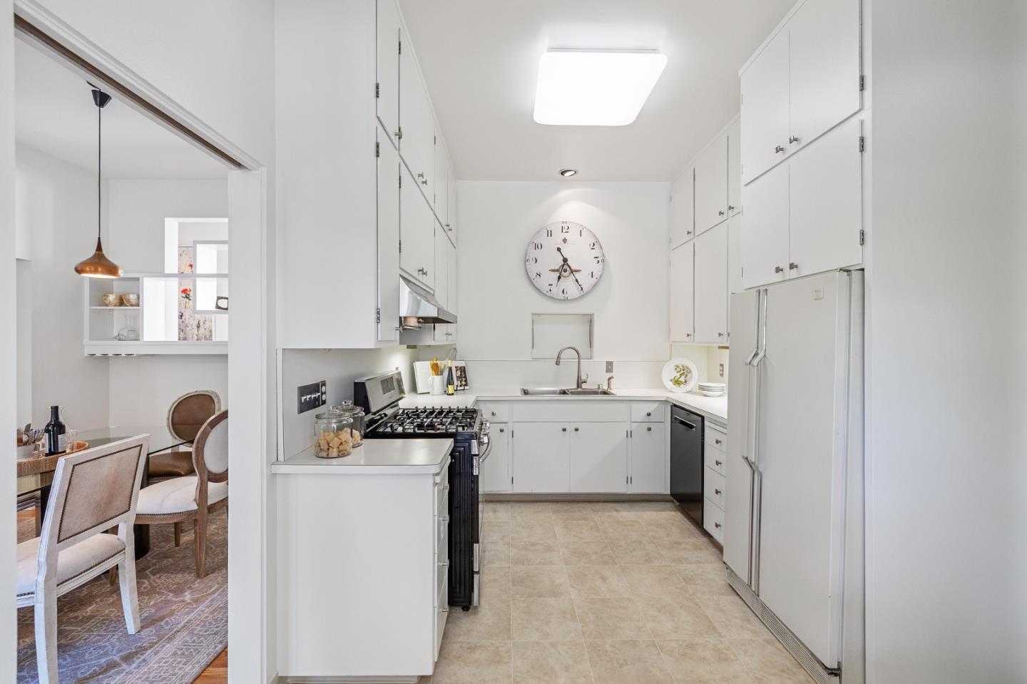 729 Tolman Drive Stanford, CA 94305 - Photo 10 of 48 a room that has a washer and dryer in it