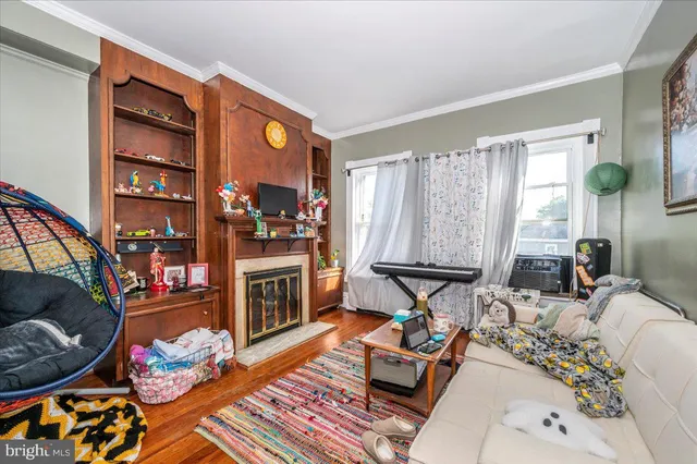a kitchen with stainless steel appliances a stove a sink and a cabinets