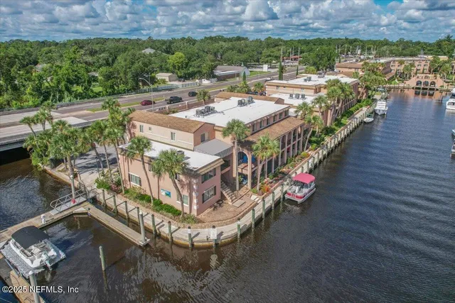a view of a house with balcony and outdoor space
