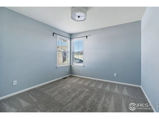 a view of an empty room with window