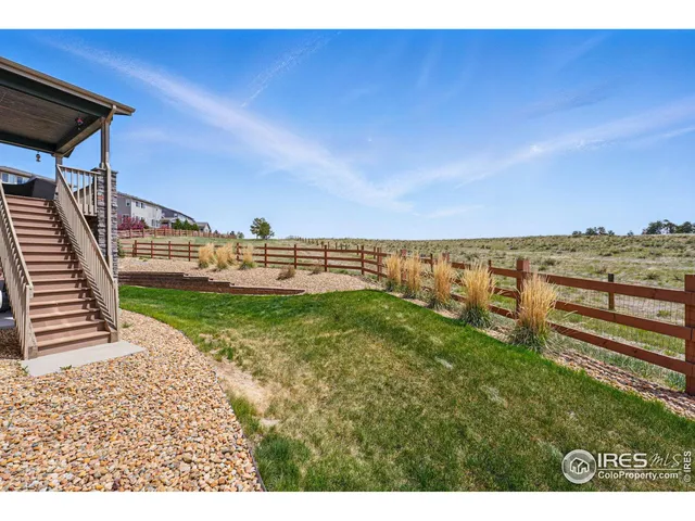 a view of a terrace with a garden