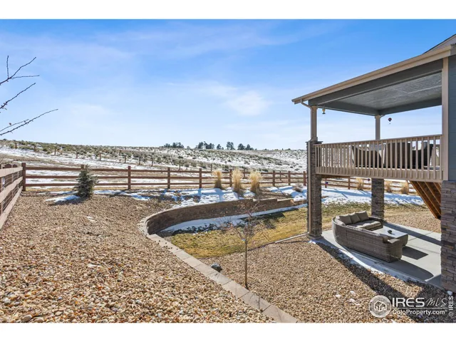 a view of a swimming pool with a lounge chair