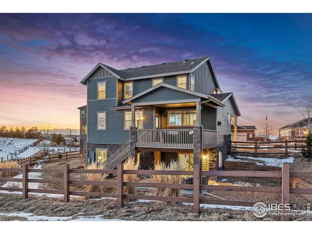 a front view of a house with a porch