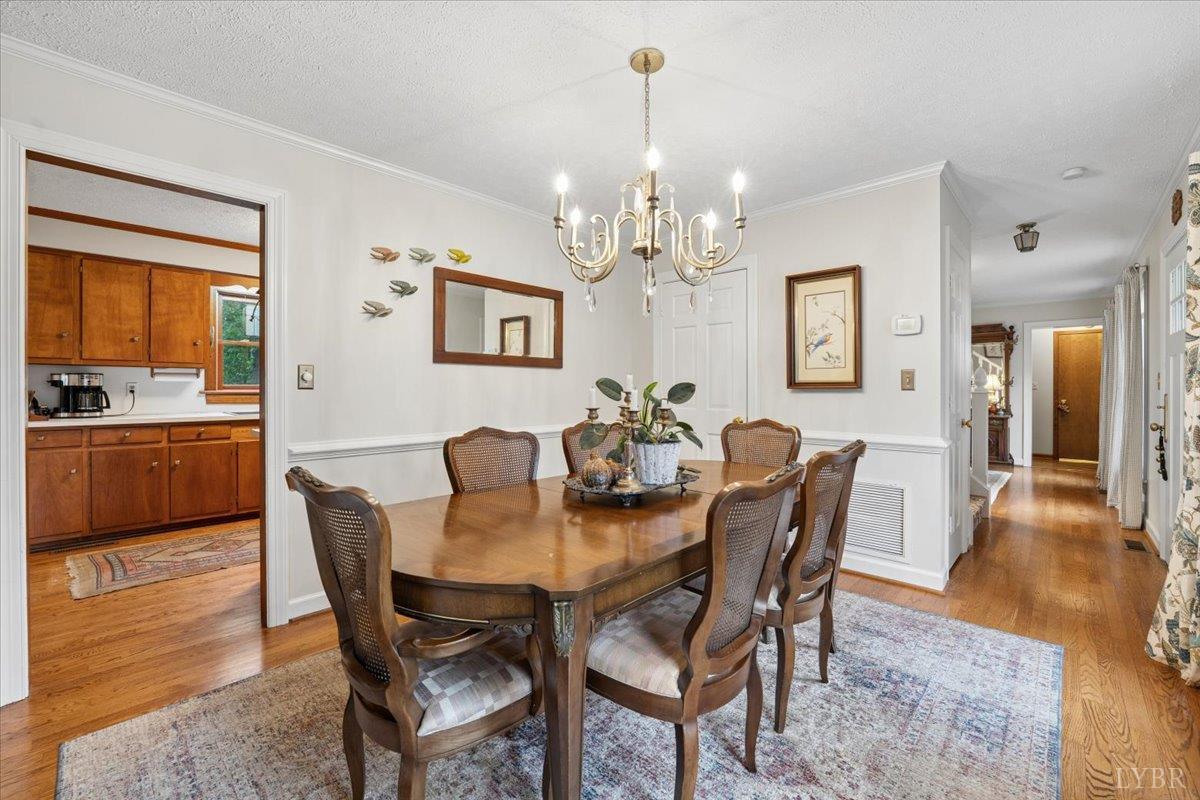 3289 Peaks Road Bedford, VA 24523 - Photo 25 of 71 a view of a dining room with furniture and wooden floor