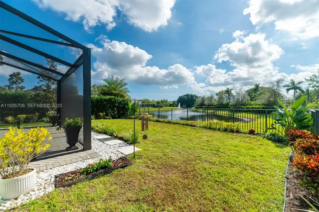a view of a swimming pool with a patio