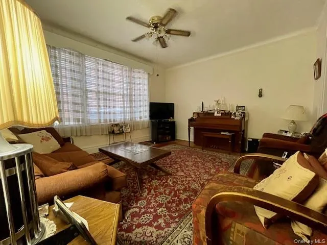 a workspace with furniture and a window